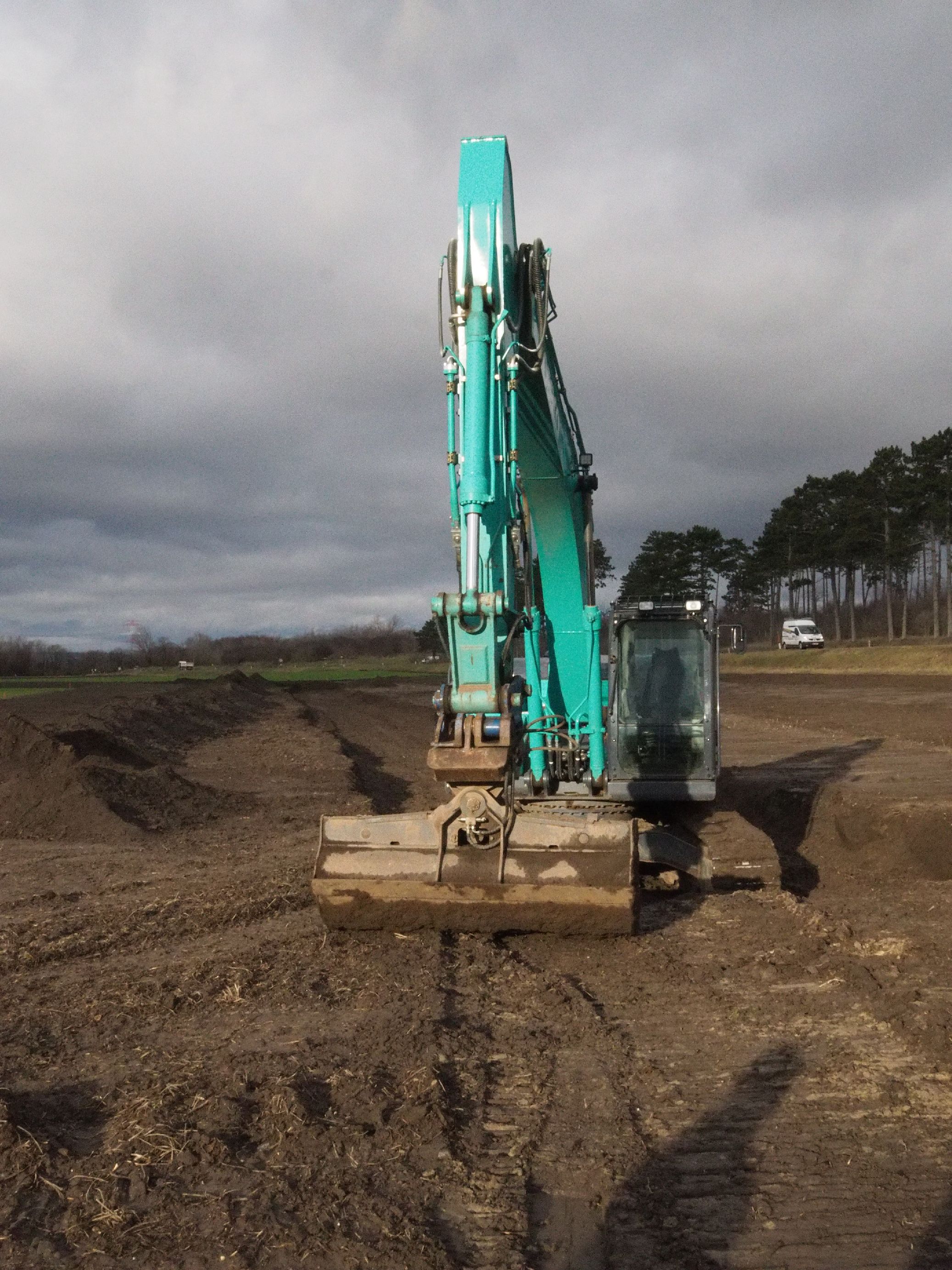 Ein türkiser Bagger